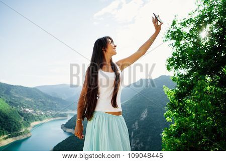 Happy Girl Taking Selfie Photo On Telephone