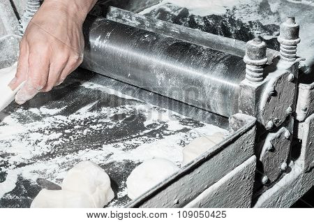 Chef Cooking The Dough On Sheeter