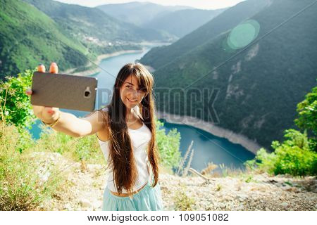 Happy Girl Taking Selfie Photo On Telephone