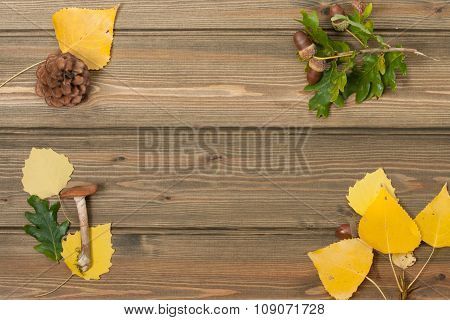 Oak Acorns, Pine Cone, Autumn Leaves, Wild Mushroom. Wooden Tabl