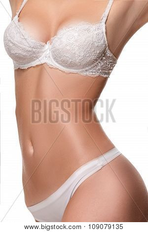 Beautiful slim body of a woman in lingerie