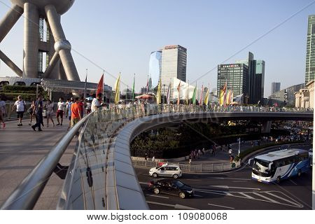 SHANGHAI, CHINA, 25 JULY, 2015:Visitors in Shanghai. Tourists in the Shanghai Lujiazui financial and Trade Zone at 25 July, 2015