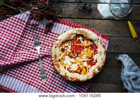 Vegetable ragout , vegetable casserole with tomato, food close up. Vegetable ragout on wood table, c