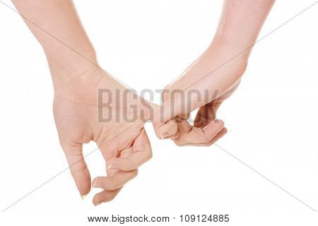 Woman's and man's hands together.