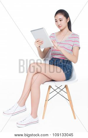 Girl Sitting On A Chair