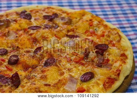 Pizza with smoked sausages
