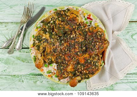 Chicken Tabaka. Garnish Rice With Vegetables