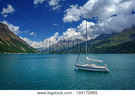 Amazing sunny day at Champferersee lake in the Swiss Alps. Silvaplana village, Switzerland, Europe.