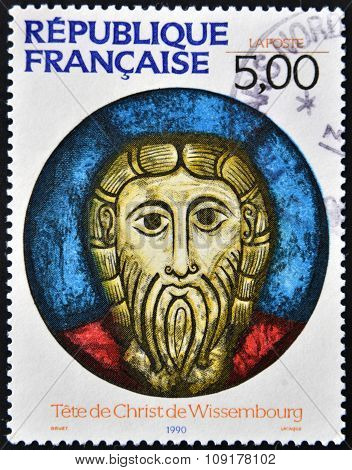 FRANCE - CIRCA 1990: A stamp printed in France shows The head of Christ Wissembourg circa 1990