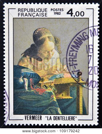 FRANCE - CIRCA 1982: a stamp printed in France shows The Lacemaker Painting by Vermeer circa 1982