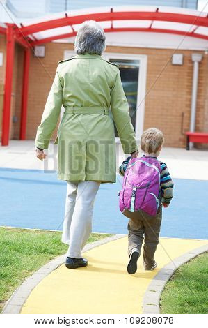 Grandmother Taking Grandson To School