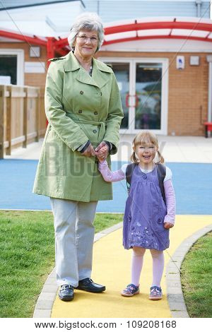 Grandmother Taking Granddaughter To School