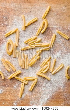 uncooked pasta casarecce with white flour