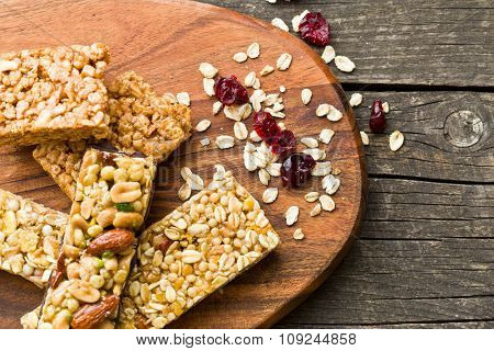 muesli bars on old wooden table