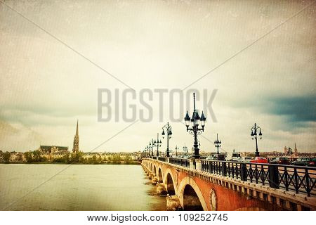 Old stony bridge in Bordeaux, France Europe
