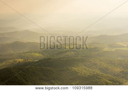 Hilly Valley And Diffused Sunlight