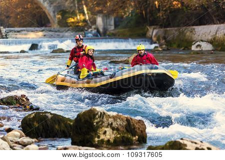 Adventurous Group Doing White Water Rafting The Rapids Of River Voidomatis In Konitsa