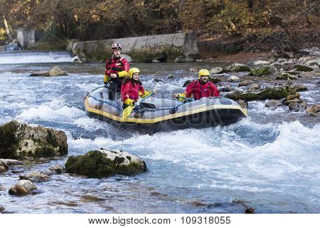 Adventurous Group Doing White Water Rafting The Rapids Of River Voidomatis In Konitsa