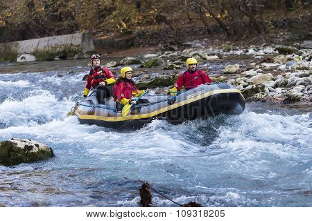 Adventurous Group Doing White Water Rafting The Rapids Of River Voidomatis In Konitsa