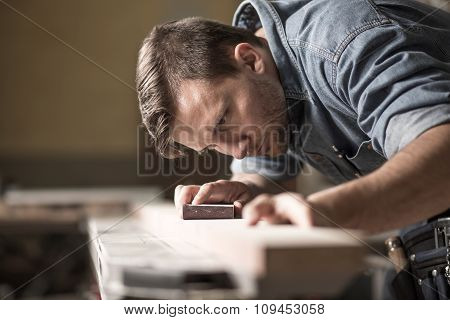 Cabinetmaker During Work In Workshop