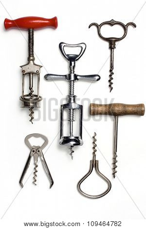 collection of vintage corkscrews on white