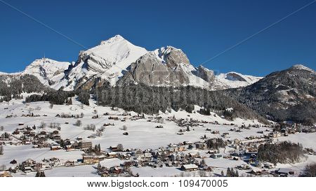 Snow Covered Mt Säntis And Village Wildhaus