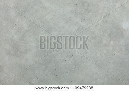 Grungy white concrete wall background. Background from high detailed fragment stone wall. Cement texture. Grey concrete wall.