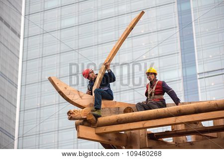 Chinese Workers Building A Temple