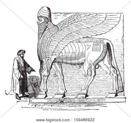 Winged figure in a portal, Nimrud, vintage engraved illustration. Industrial encyclopedia E.-O. Lami - 1875.