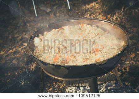 Cast Iron Pot Outdoors, Cooking On A Fire.