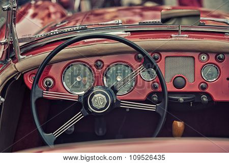 Sleza, Poland, August 15, 2015: Close Up On Vintage Car Steering Wheel And Kockpit On  Motorclassic