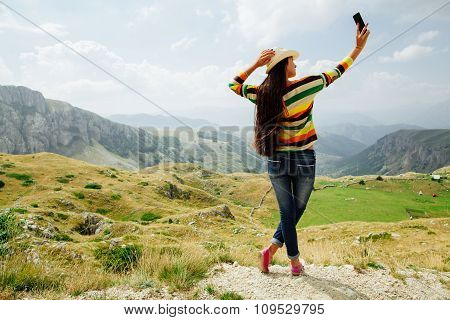 Selfie Photo Long Hair Girl Taking On Smartphone In  Mountain Village
