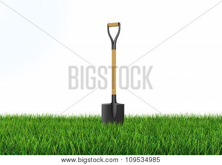Shovel on grass (clipping path included)