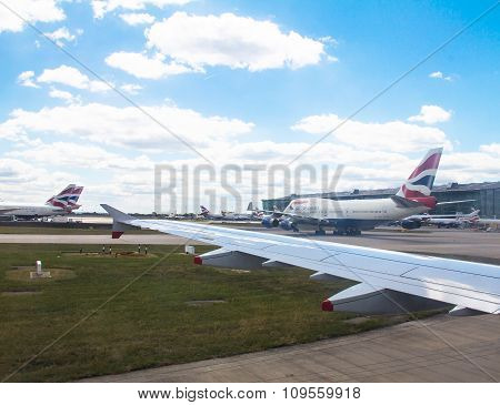 Taxiing Aircraft Airbus A-320  After Landing In Heathrow Airport . London. Uk