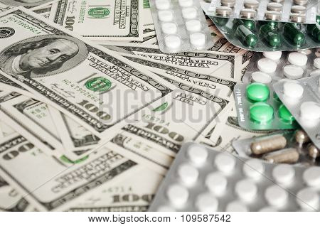 Hundred Dollar Bills And Pills Blisters Close-up
