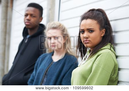 Group Of Teenagers In Urban Environment