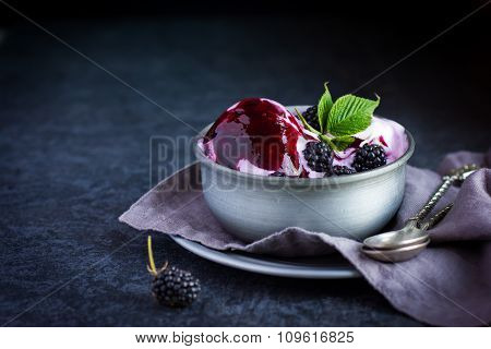 Delicious Homemade Blackberry  Ice Cream With Blackberry Topping And Fresh Berry