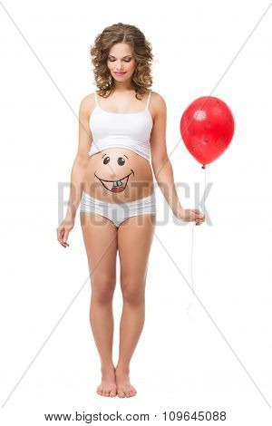 Pregnant woman with air balloon