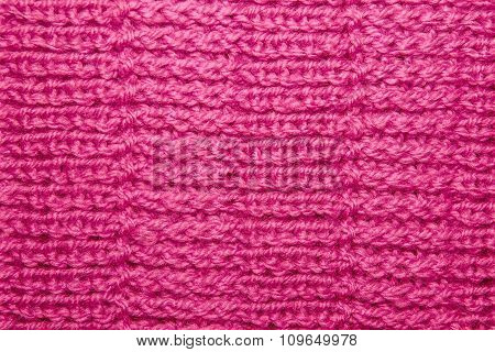 Wool hand-knitted Pattern. Closeup Fabric texture Background