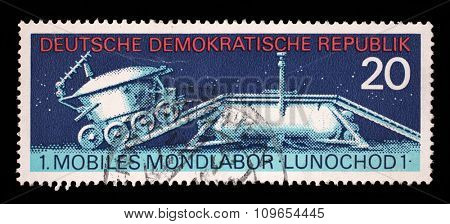 GDR - CIRCA 1971: stamp printed in East Germany shows the soviet moon machine Lunokhod - 1, circa 1971