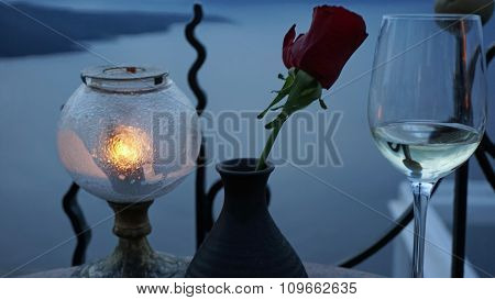 A Vine Glass And A Rose On Greece Island