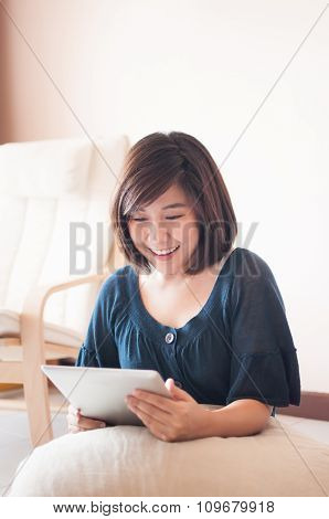 Woman Holding Digital Tablet And Felling Wonderful.