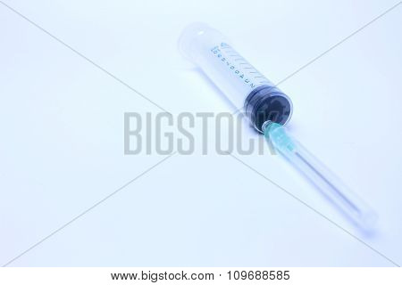 Plastic syringe