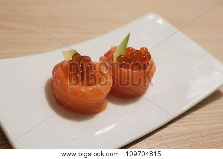 Salmon Ikura (salmon Eggs And Avocado Wrapped With Raw Salmon)