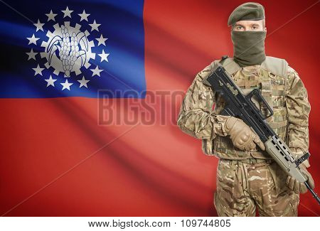 Soldier Holding Machine Gun With Flag On Background Series - Burma