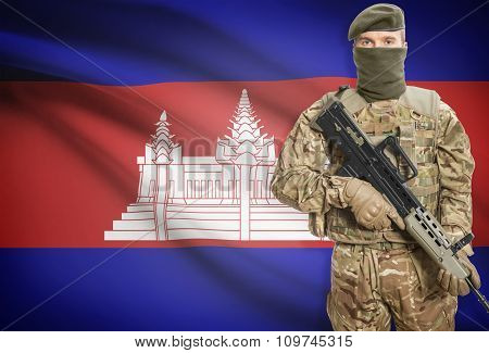 Soldier Holding Machine Gun With Flag On Background Series - Cambodia