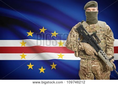 Soldier Holding Machine Gun With Flag On Background Series - Cape Verde