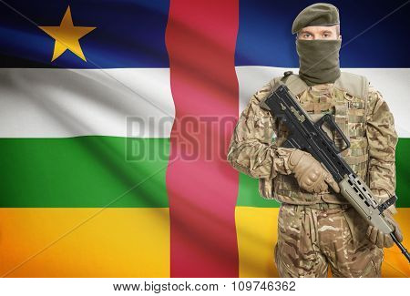 Soldier Holding Machine Gun With Flag On Background Series - Central African Republic