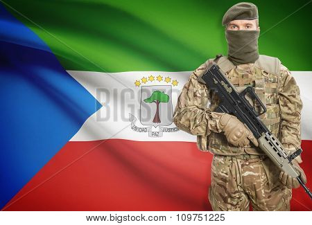 Soldier Holding Machine Gun With Flag On Background Series - Equatorial Guinea