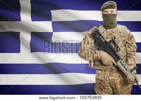 Soldier Holding Machine Gun With Flag On Background Series - Greece
